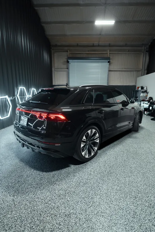 Audi Q8 rear three-quarter in the shop